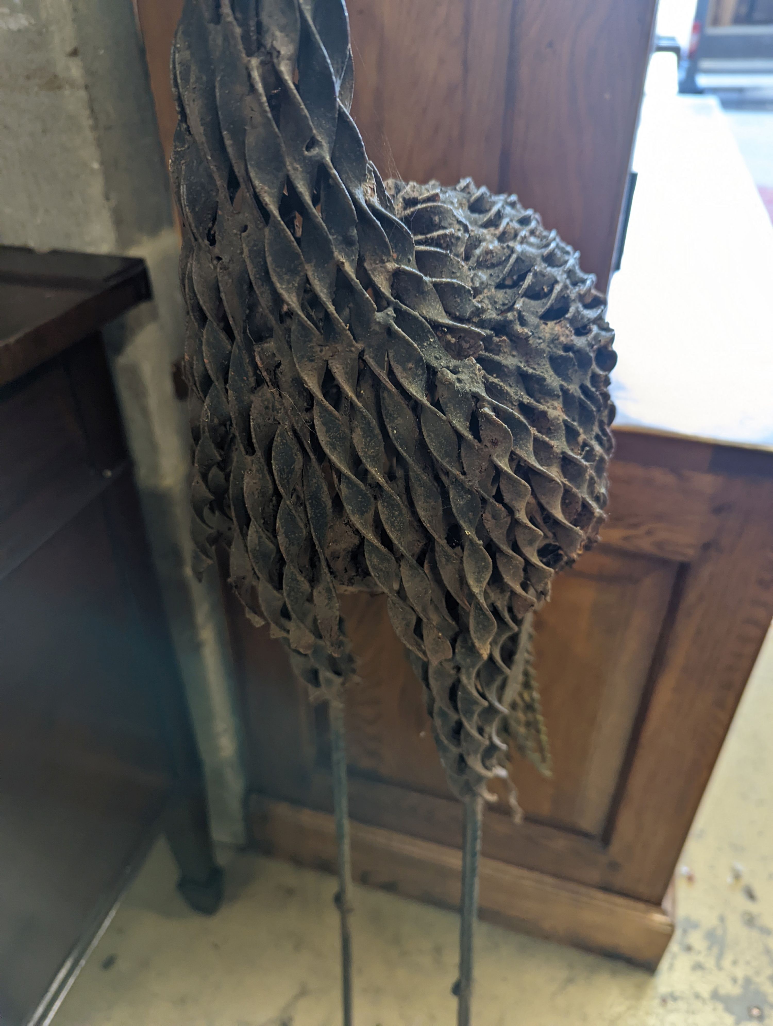 A wrought iron peacock garden ornament, height 170cm